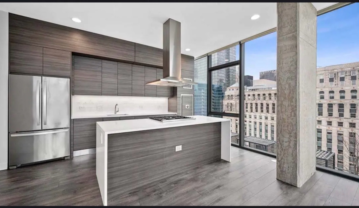 Downtown Chicago high rise kitchen white quartz island