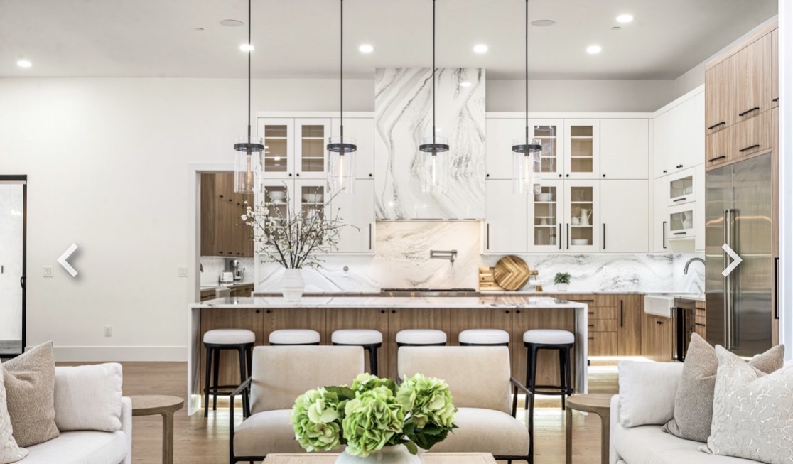 Open concept kitchen marble hood surround island Chicago