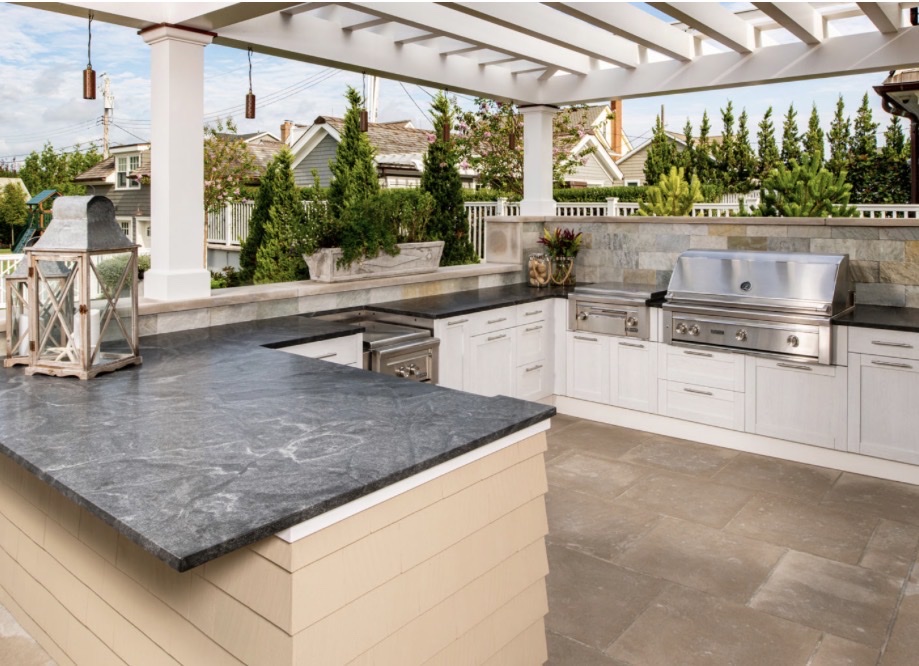 Outdoor kitchen soapstone countertops pergola Chicago suburbs